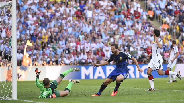 Higuain celebrated the goal, while the linesman raised his offside flag in the background