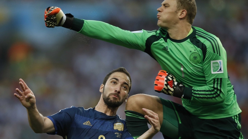 Manuel Neuer (R) has penned a two-year extension at Bayern Munich