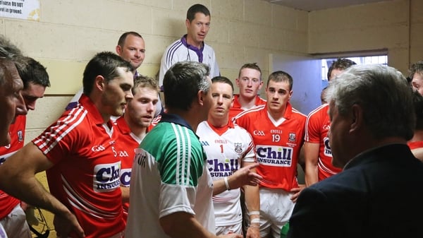 TJ Ryan congratulates the Cork players