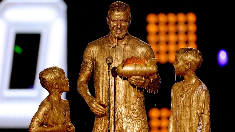 David Beckham and sons Romeo and Cruz get slimed