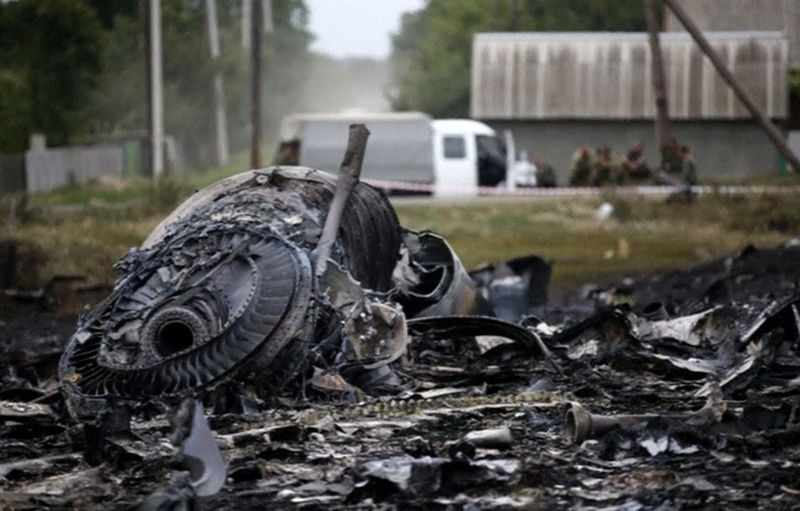 Ukrainian authorities and Russian-backed separatists have accused each other of bringing down the plane