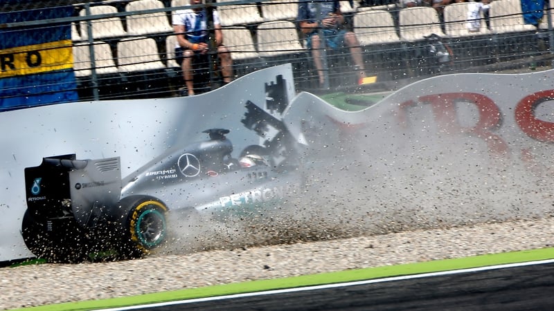 Lewis Hamilton crashes into the hoardings at Hockenheim