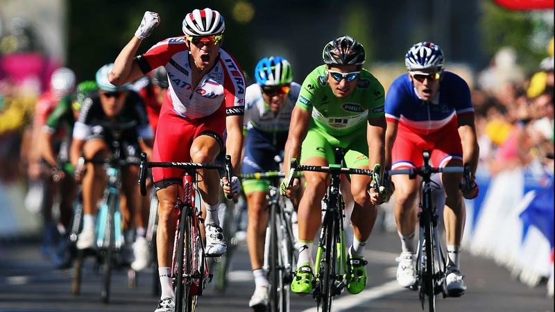 Alexander Kristoff punches the air in celebration