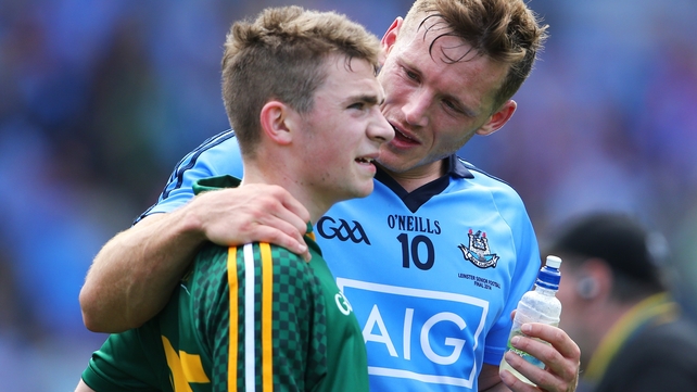 Dublin's Paul Flynn consoles Joseph Wallace of Meath after the game