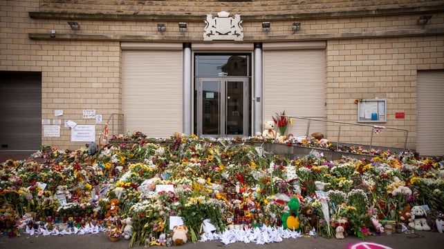 Flowers and tributes are placed outside the Dutch embassy in Kiev