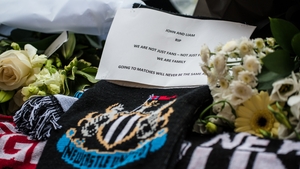 Tributes left by fellow Newcastle fans to John Alder and Liam Sweene, who were en route to New Zealand to see Newcastle FC play