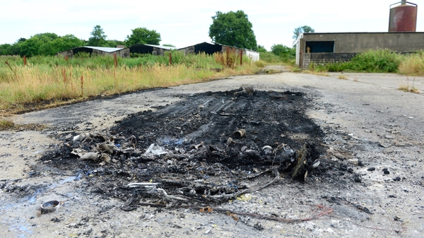 A car used by two masked men who abducted the teen was found burned out