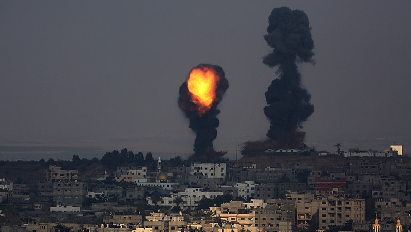 Smoke rises after an Israeli airstrike in Al Shejaeiya neighbourhood during a military operation in eastern Gaza City