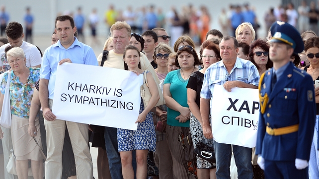 Local residents stand in solidarity with the families and victims of MH17