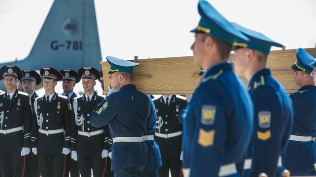 The dignified ceremony was in stark contrast to the body retrieval by pro-Russian rebels following the crash