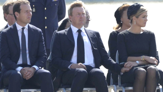 (L-R) Dutch Deputy Prime Minister Lodewijk Asscher, King Willem-Alexander, Queen Maxima at the airbase in Eindhoven