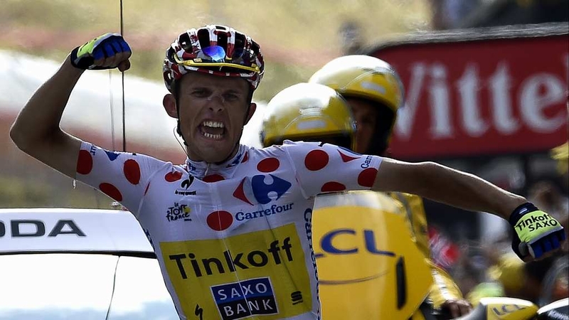 Rafal Majka roars in delight as he crosses the finish line