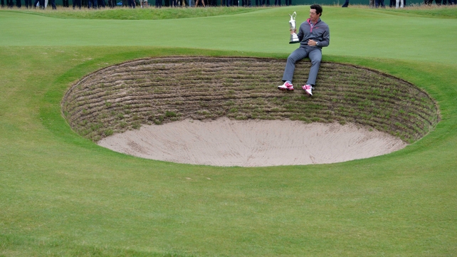 Rory McIlroy poses with the Claret Jug after winning the Open on Sunday