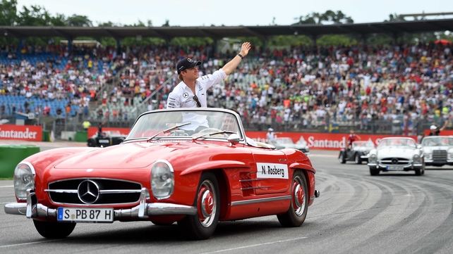 Nico Rosberg takes part in the drivers' parade before the German Grand Prix at Hockenheimring on Sunday