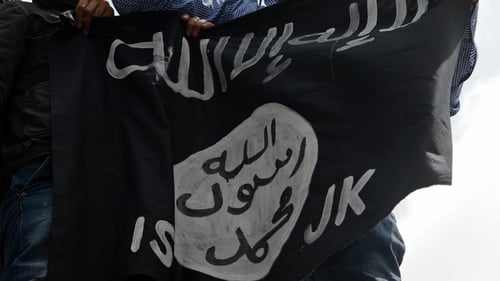 The flag of the Islamic State (IS), which is reported to have ordered female genital mutilation