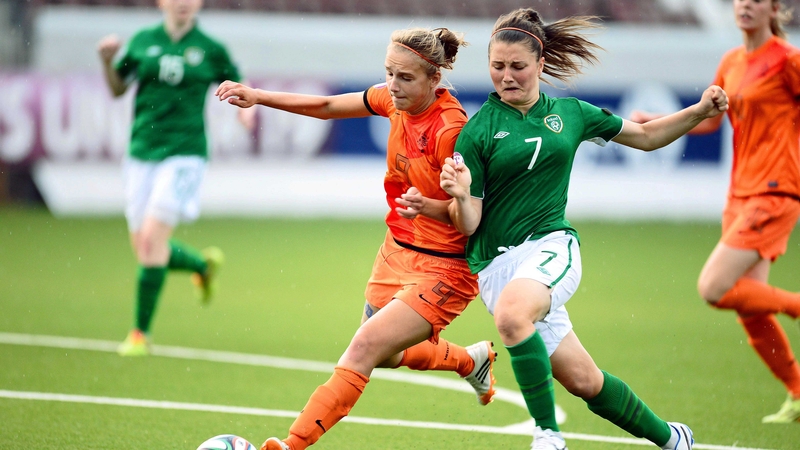 Netherlands' Vivianne Miedema and Keeva Keenan of Ireland battle for the ball