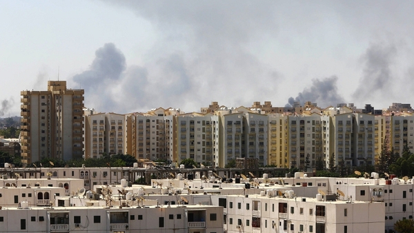Militias have exchanged rocket and artillery fire for two weeks in southern Tripoli