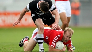 Sligo’s Brian Curran and Michael Shields of Cork