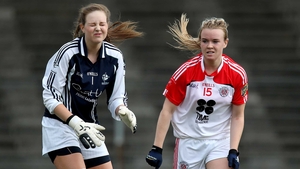 Tyrone's Cara McCrossan celebrates scoring as Kildare goalkeeper Becky McGuirk looks on dejected