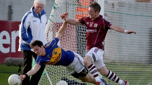 Ciaran McDonald of Tipp with Danny Cummins of Galway
