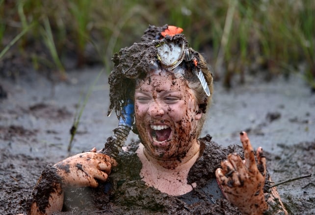 A woman enjoys the so-called Bog Jacuzzi at the Bog Snorkelling championship