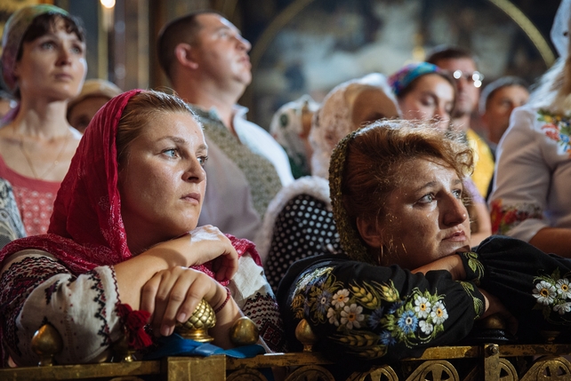 People attend a prayer service in the St Volodymir cathedral in Kiev, Ukraine