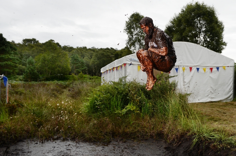 A man takes part in the Irish Bog Snorkelling championship in Dungannon to mark International Bog Day