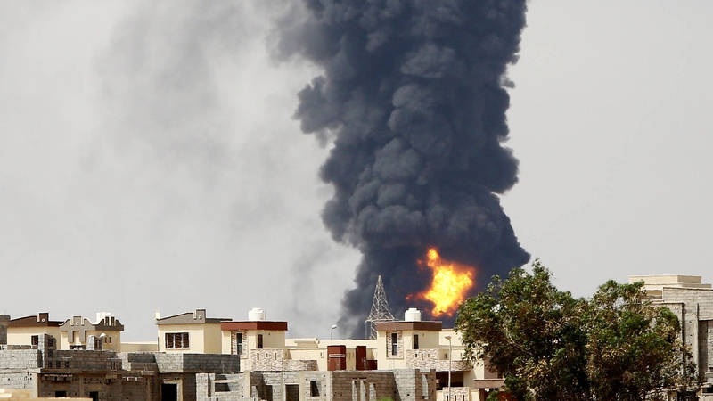 A huge fire erupted at an oil depot outside the Libyan capital today