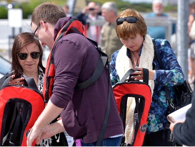 Hamill's wife Marilou and his daughter Chelsea arrive at the harbour