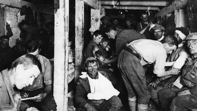 British soldiers relaxing and having wounds treated in an underground forward dressing station by the Menin Road