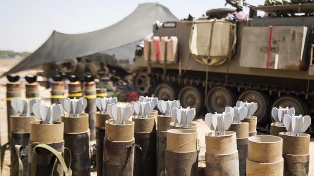 Mortars ready to be fired are stored at an Israeli army staging area along the border with Gaza