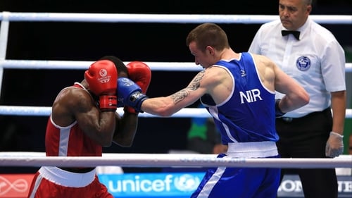 Steven Donnelly penetrates Custio Clayton's defence in Glasgow