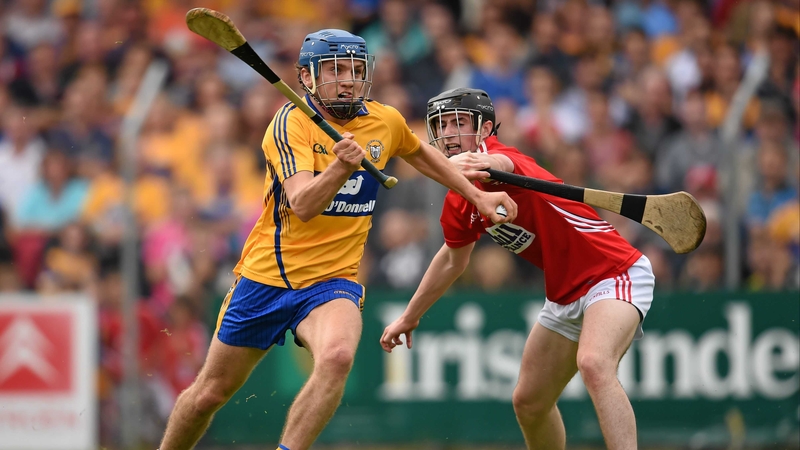 Clare talisman Shane O'Donnell evades the Rebels' Michael Collins on the way to scoring the opening goal in Ennis