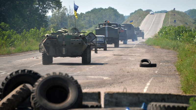Ukrainian troops patrol near the eastern Ukrainian city of Debaltseve in the Luhansk region