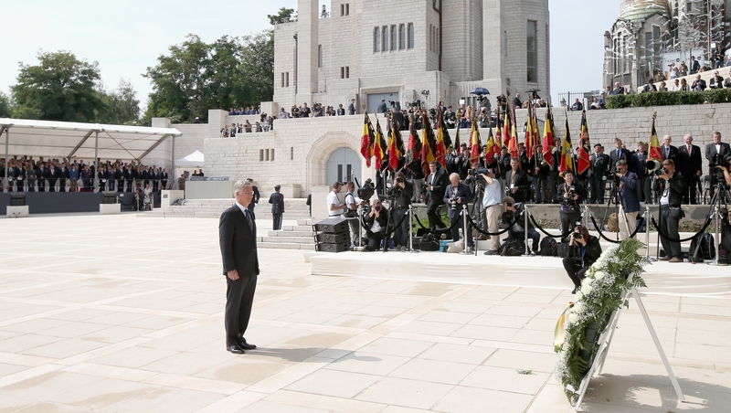 King Philippe of Belgium lays a wreath at the ceremony in Liege