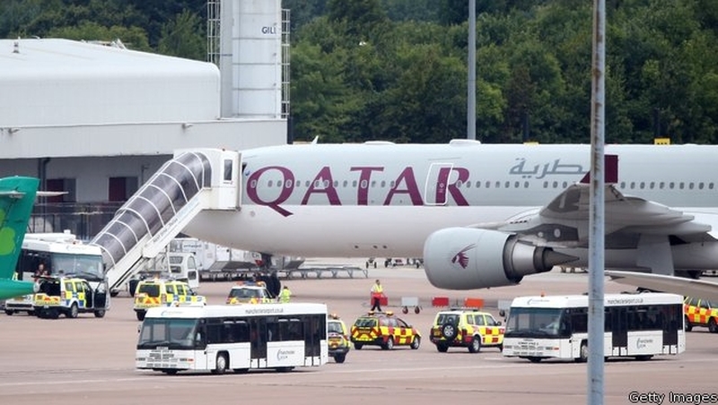 The Qatar Airways plane on the tarmac in Manchester Airport after it landed