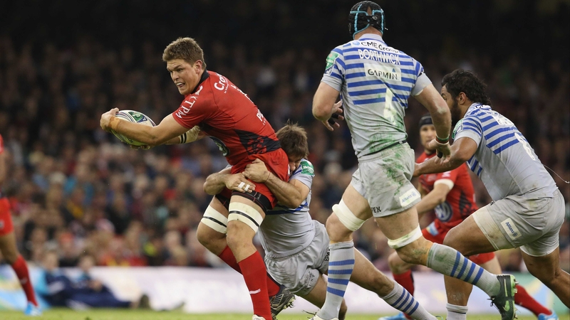 Juan Smith is tackled while representing winners Toulon in the Heineken Cup final