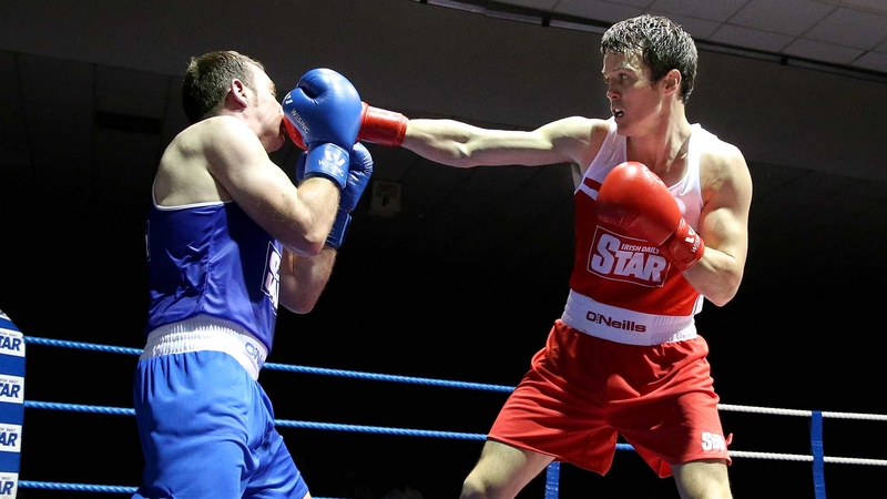 Darren O’Neill (red) fights in place of the injured Joe Ward