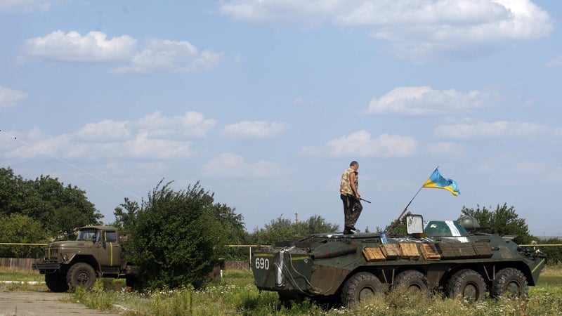 Ukrainian servicemen from the Donbass volunteer battalion prepare for redeployment
