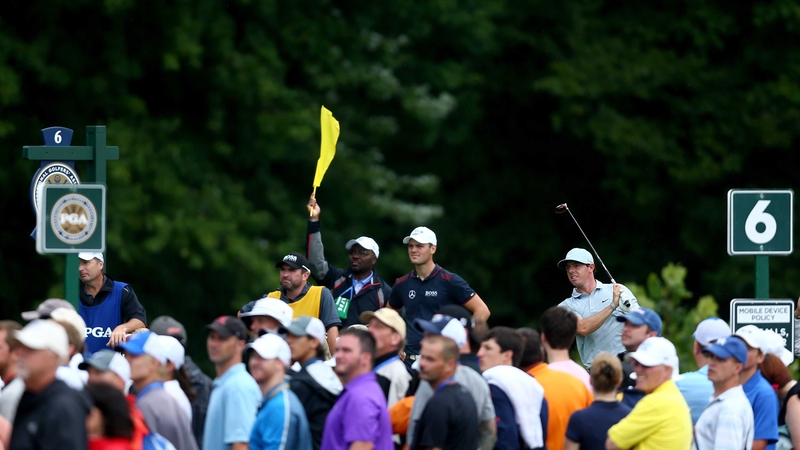 All eyes are on McIlroy's tee shot on the sixth