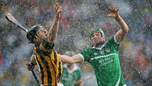 Jackie Tyrell and Shane Dowling compete for a high ball