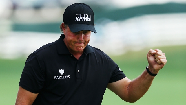 Phil Mickelson got early momentum with birdies at at the first and third hole and eventually shot 31 for the front nine