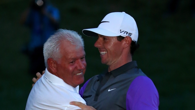 Father Gerry is one of the first to congratulate Rory on the green