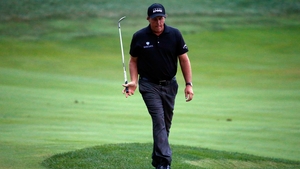 This Major was once branded 'Glory's Last Shot'... Mickelson's valiant chip for eagle rolled just past the hole on 18
