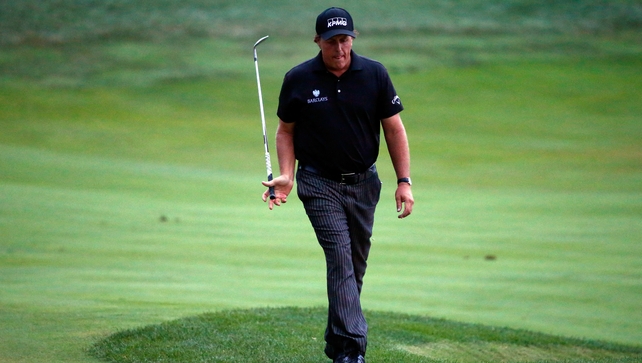 This Major was once branded 'Glory's Last Shot'... Mickelson's valiant chip for eagle rolled just past the hole on 18