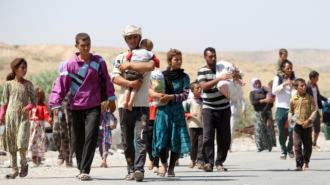 Displaced Iraqi families from the Yazidi community at the Iraqi-Syrian border
