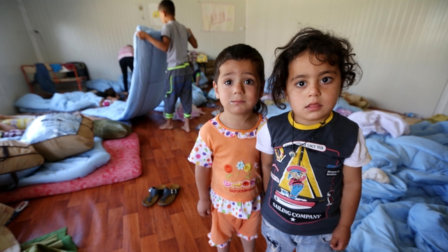 Iraqi Christian children take refuge in a room of Ainkawa's St Joseph church on the outskirts of Irbil