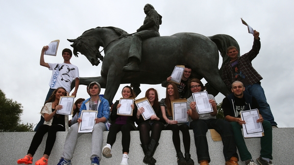 Leaving certificate students from Trinity Comprehensive in Ballymun celebrate with their results
