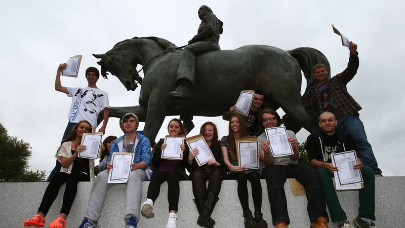 Leaving certificate students from Trinity Comprehensive in Ballymun celebrate with their results