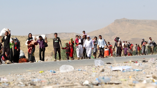 Members of the Yazidi community displaced by IS